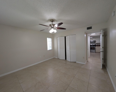 5011 Wiles Road - Photo Thumbnail 10