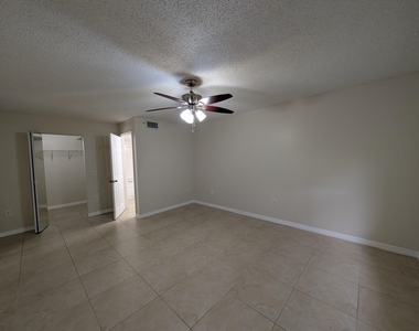 5011 Wiles Road - Photo Thumbnail 6