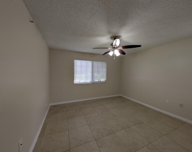 5011 Wiles Road - Photo Thumbnail 9