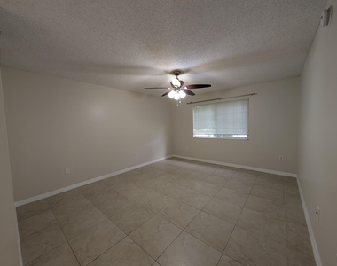 5011 Wiles Road - Photo Thumbnail 8