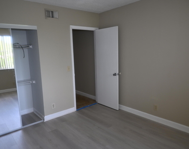 8721 Wiles Road - Photo Thumbnail 7