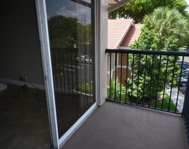 8721 Wiles Road - Photo Thumbnail 21