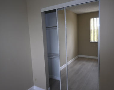 8721 Wiles Road - Photo Thumbnail 8
