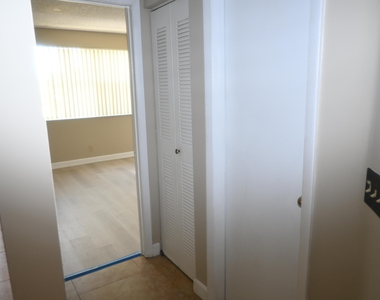 8721 Wiles Road - Photo Thumbnail 4