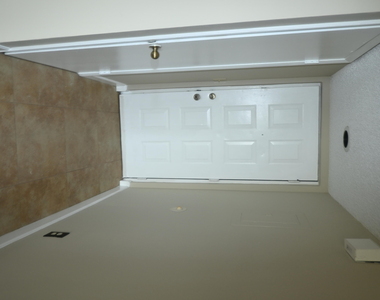 8721 Wiles Road - Photo Thumbnail 16