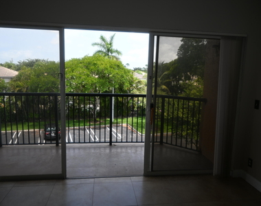 8721 Wiles Road - Photo Thumbnail 17