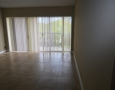 8721 Wiles Road - Photo Thumbnail 5