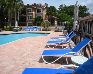 8721 Wiles Road - Photo Thumbnail 2