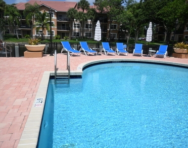 8721 Wiles Road - Photo Thumbnail 1