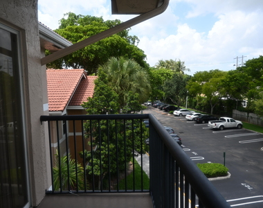 8721 Wiles Road - Photo Thumbnail 22