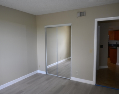 8721 Wiles Road - Photo Thumbnail 9
