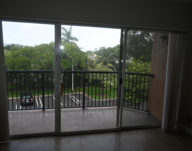 8721 Wiles Road - Photo Thumbnail 23