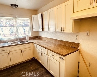 1221 W 59th - Photo Thumbnail 7