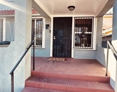 1221 W 59th - Photo Thumbnail 2