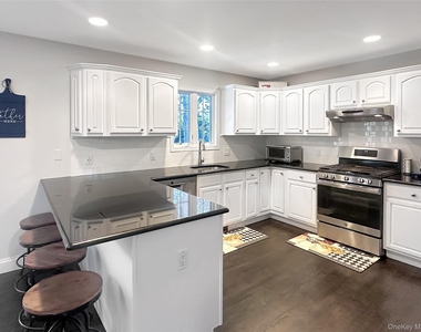 5765 Bergen Avenue - Photo Thumbnail 8