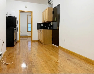404 E 73rd Street - Photo Thumbnail 2
