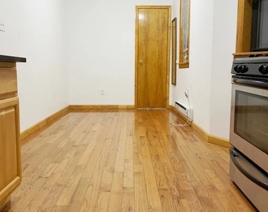 404 E 73rd Street - Photo Thumbnail 4