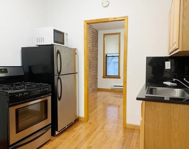 404 E 73rd Street - Photo Thumbnail 3