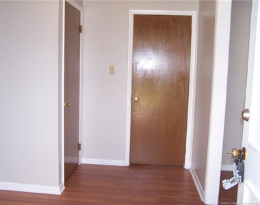 6813 Brush Creek Road - Photo Thumbnail 1