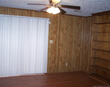 6813 Brush Creek Road - Photo Thumbnail 3