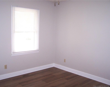 6813 Brush Creek Road - Photo Thumbnail 13