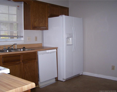 6813 Brush Creek Road - Photo Thumbnail 7
