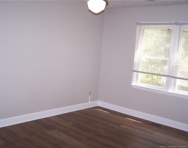 6813 Brush Creek Road - Photo Thumbnail 12