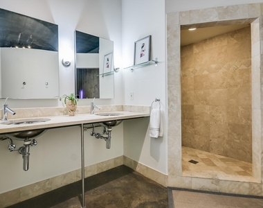 311 W 5th St - Photo Thumbnail 4