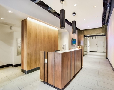 311 W 5th St - Photo Thumbnail 12