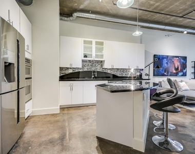 311 W 5th St - Photo Thumbnail 2