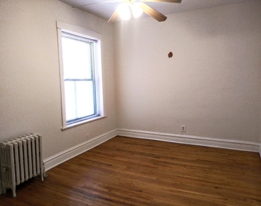 709 W Cornelia Avenue - Photo Thumbnail 5