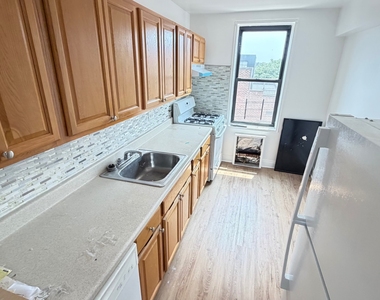 102-30 67th Avenue - Photo Thumbnail 9