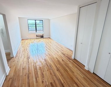 102-30 67th Avenue - Photo Thumbnail 1