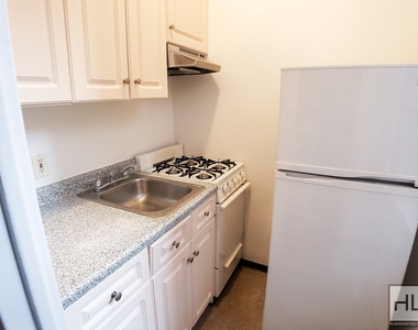 E 55 St - Photo Thumbnail 2