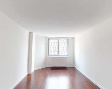 401 E 34th St - Photo Thumbnail 3