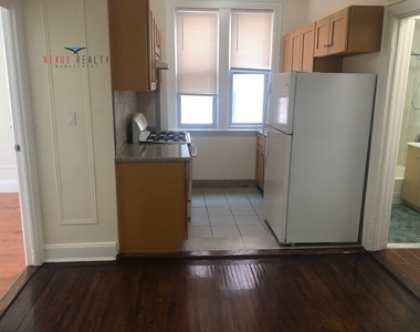 43-22 58th Street - Photo Thumbnail 3
