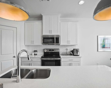7637 Avalon Boulevard - Photo Thumbnail 3