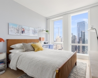 W 38th Street - Photo Thumbnail 2