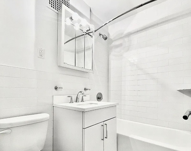 E 55 St - Photo Thumbnail 2