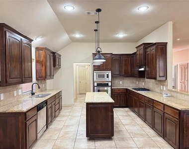 7704 Fallen Antler Place - Photo Thumbnail 7