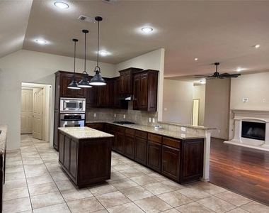 7704 Fallen Antler Place - Photo Thumbnail 5