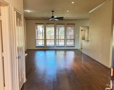 7704 Fallen Antler Place - Photo Thumbnail 3