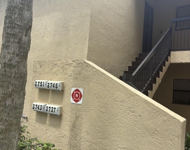 3751 Cocoplum Circle - Photo Thumbnail 3