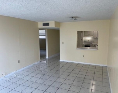 10000 Nw 80th Court - Photo Thumbnail 3