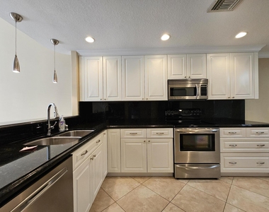 7526 Pinewalk Drive S - Photo Thumbnail 2