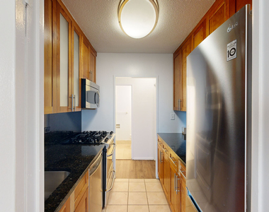 401 E 34th St - Photo Thumbnail 1