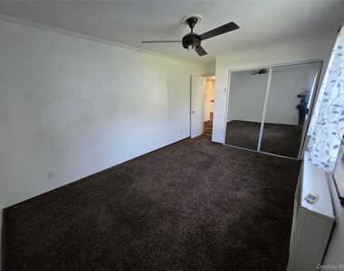 66-01 Park Drive East - Photo Thumbnail 9