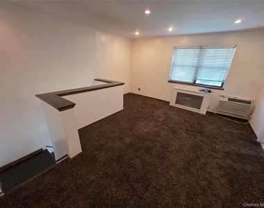 66-01 Park Drive East - Photo Thumbnail 2