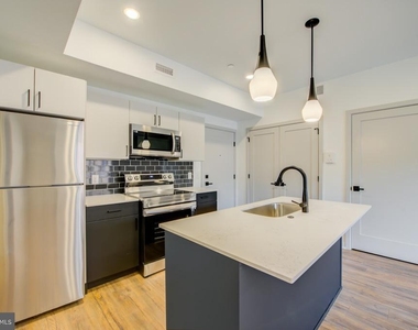 5001 Umbria Street - Photo Thumbnail 1
