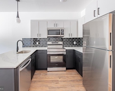 5001 Umbria Street - Photo Thumbnail 1
